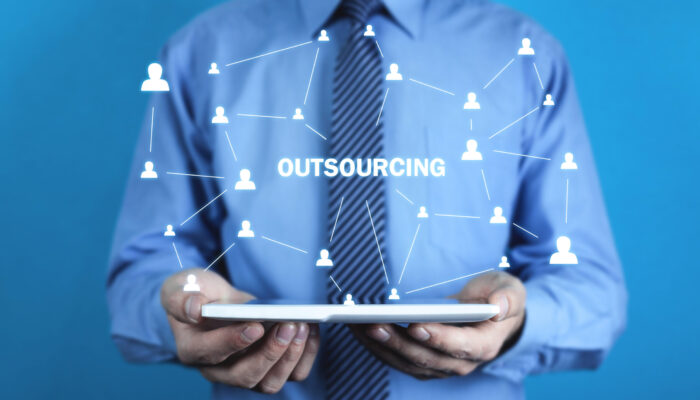 Man holding tablet. Outsourcing, business strategy concept